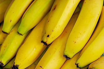 Close-up of fresh yellow bananas with natural texture