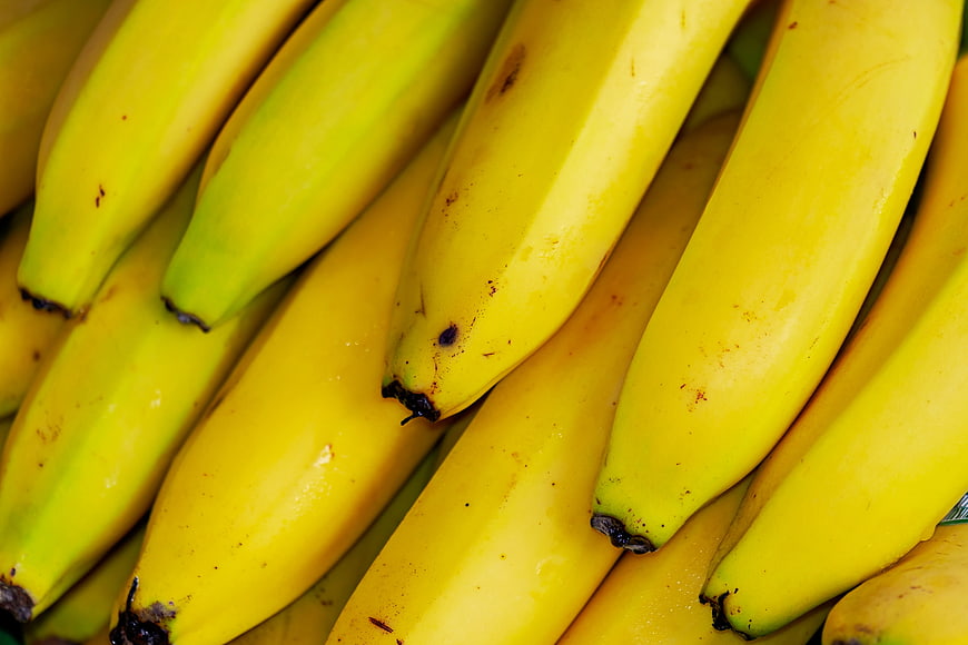 Close-up of fresh yellow bananas with natural texture