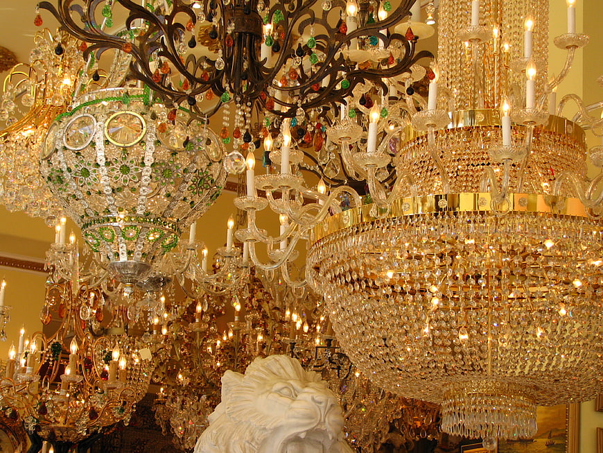 Luxurious crystal chandeliers in a grand interior showroom