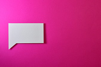 White speech bubble on vibrant pink background