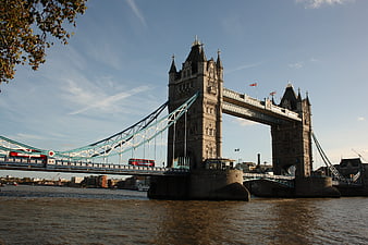 Tower Bridge London with Red Double Decker Bus on River Thames