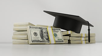 Graduation cap resting on stacks of US hundred dollar bills