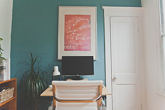 Modern Home Office Workspace with Teal Wall