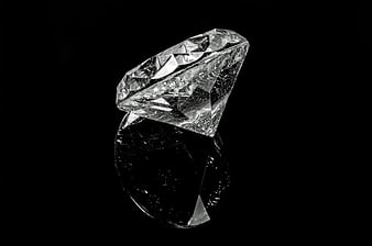Black and white diamond on black background