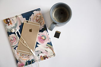 Flat Lay Workspace with Smartphone, Coffee, and Journal