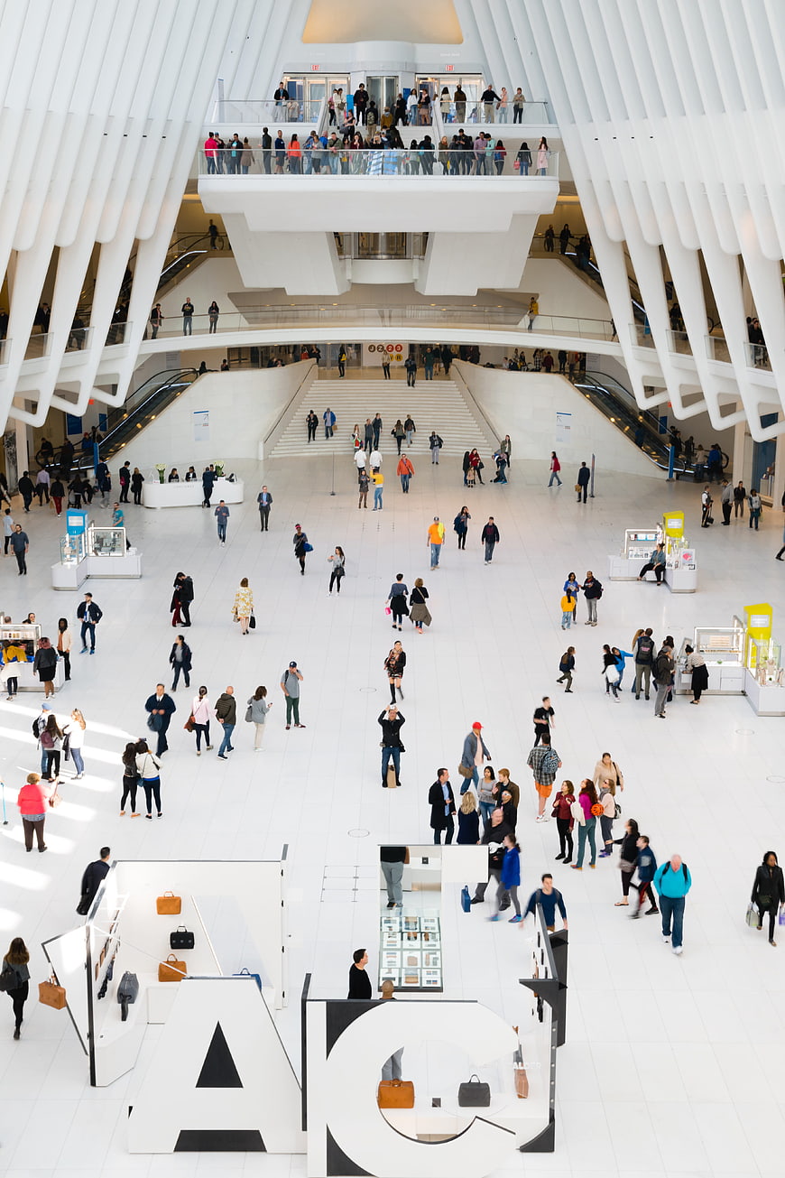 High angle view of white modern architecture interior with crowd