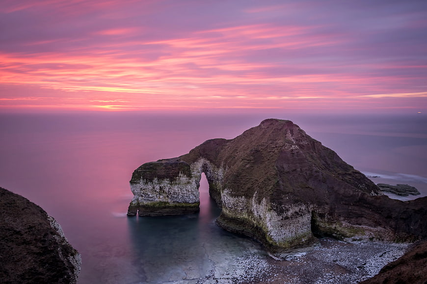 Dramatic Sunset at Étretat Natural Rock Arch