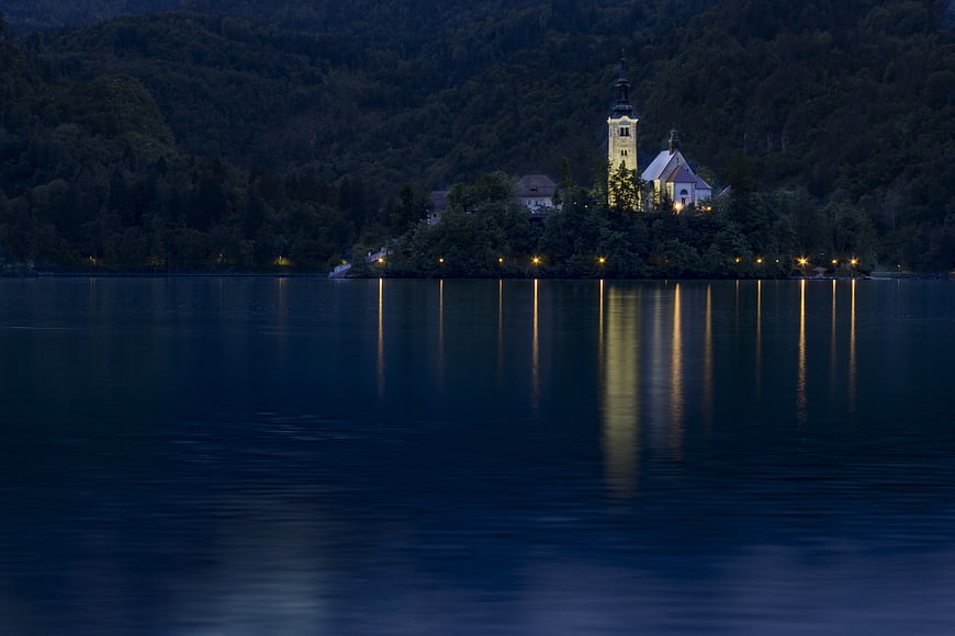 Lake Bled Island Church at Night with Reflections