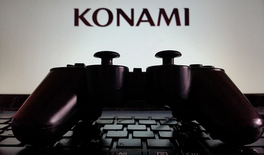 Black Game Controller On Keyboard With Konami Logo
