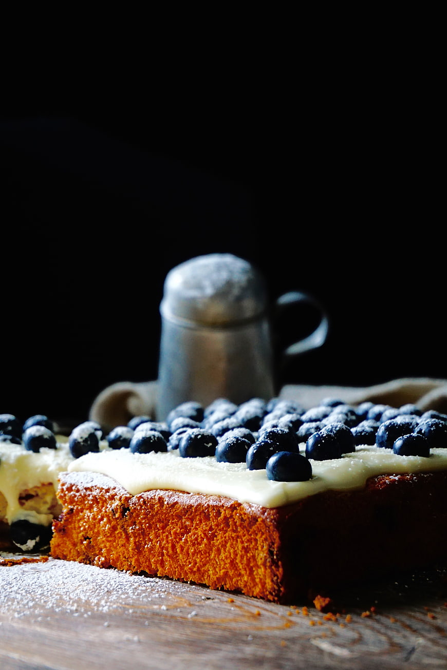 Blueberry Cake with Cream and Powdered Sugar