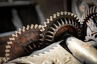 Close-up of rusty industrial gears and mechanical cogs