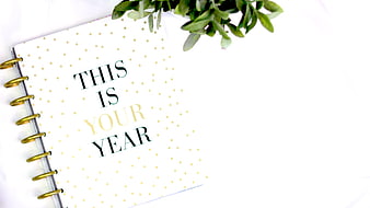 Motivational Planner with Greenery on White Background