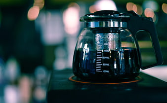 Glass Coffee Carafe with Dark Coffee on Warmer