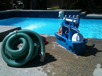 Pool cleaning equipment and vacuum hose by swimming pool