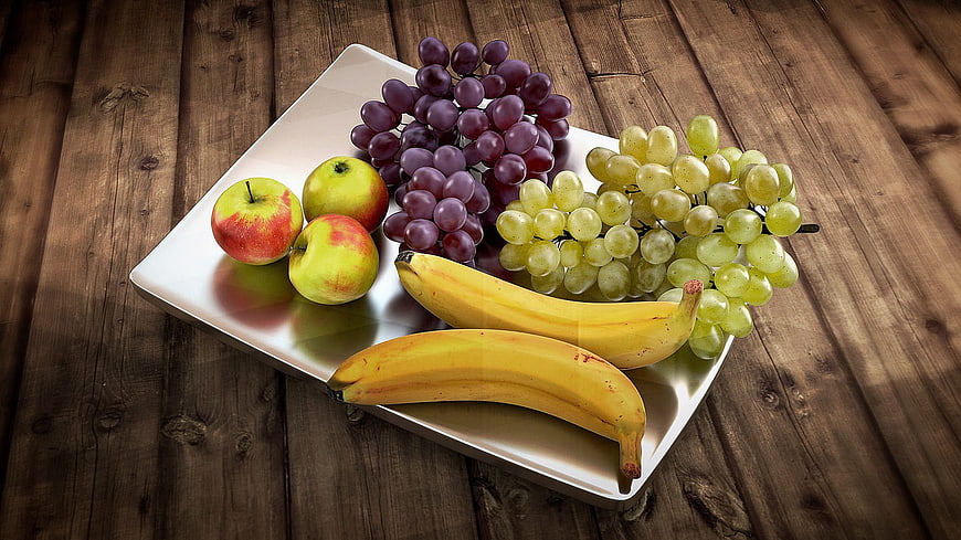 3D Rendered Fruit Platter With Bananas, Apples, And Grapes On Wooden Table