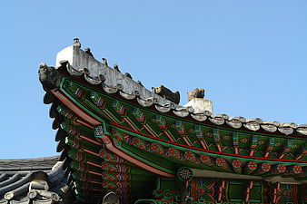 Traditional Korean Palace Roof Detail With Ornate Eaves