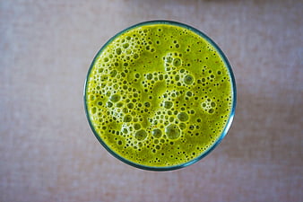 Top View of Fresh Green Smoothie with Bubbles