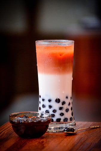 Layered Bubble Tea with Tapioca Pearls and Fruit Syrup