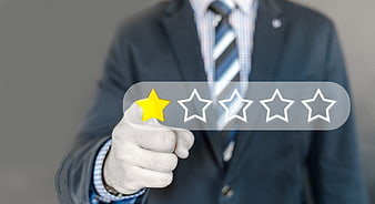 Businessman Giving One Star Rating On Digital Interface