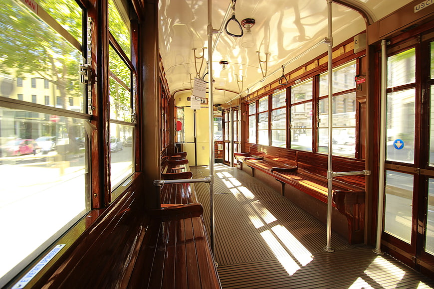 Sunlit Interior of Vintage Wooden Tram Car