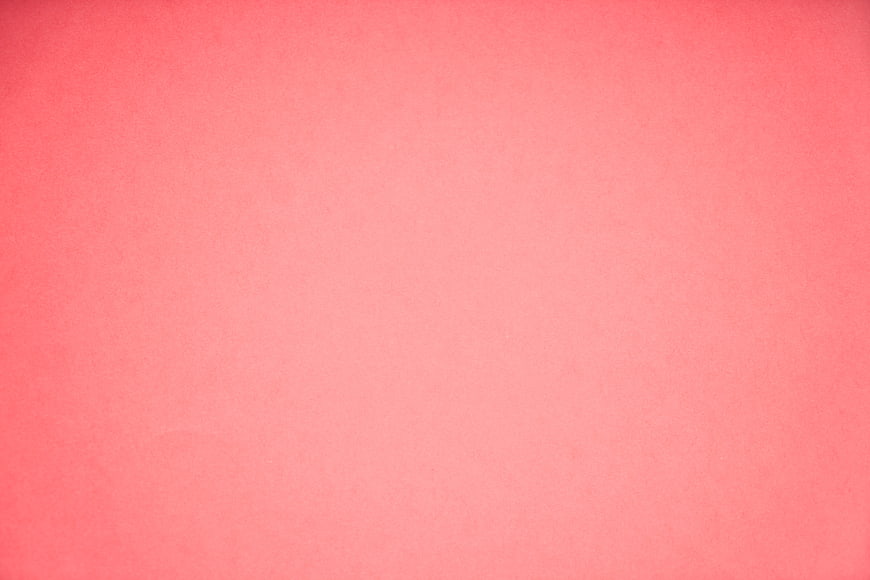 Soft Pink Paper Texture Background With Subtle Grain And Vignette