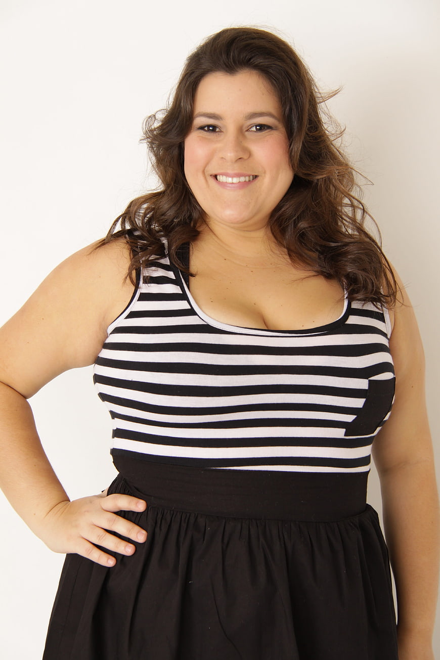 Smiling Plus Size Woman in Striped Top