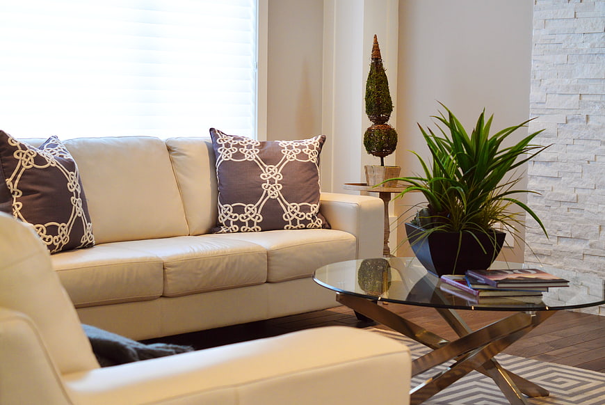 Modern Living Room Interior with White Sofa and Glass Table