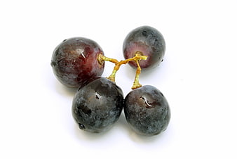 Fresh Blue Grapes With Water Droplets On White Background