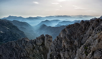 Majestic Rocky Mountain Ridge with Misty Blue Valleys