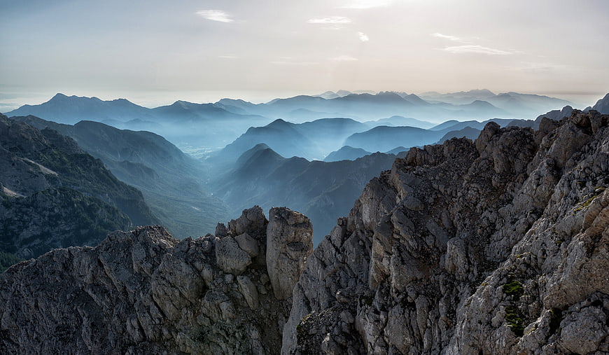 Majestic Rocky Mountain Ridge with Misty Blue Valleys
