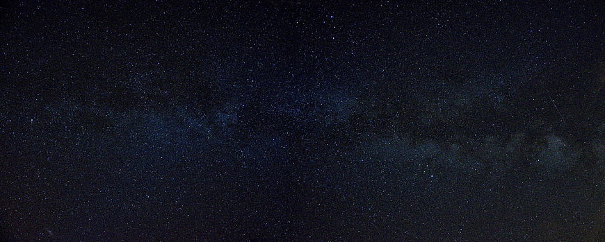 Milky Way galaxy and stars in dark night sky
