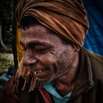 Close-up portrait of smiling man with turban