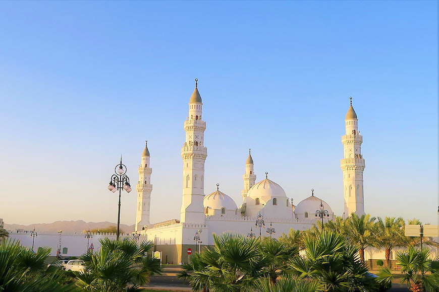 White Mosque with Minarets and Domes at Sunset