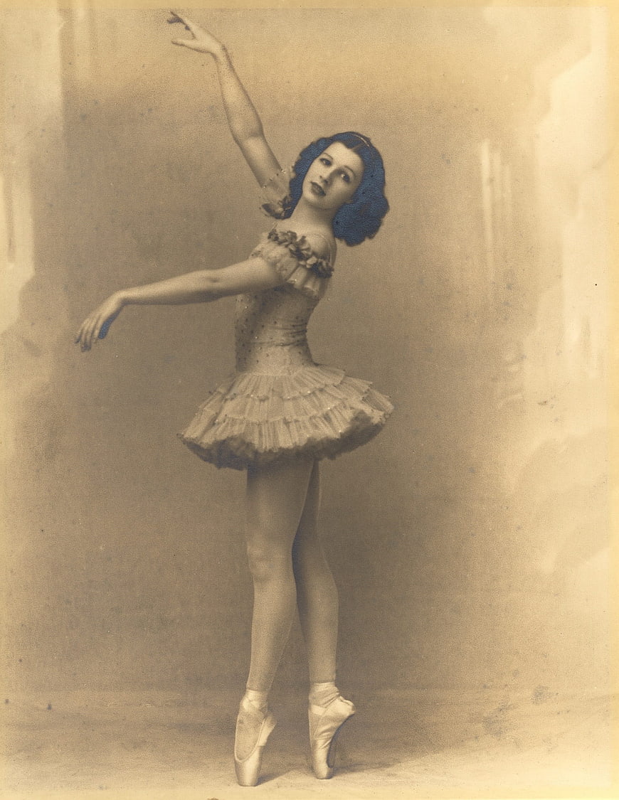 Vintage Ballerina Portrait in Tutu and Pointe Shoes