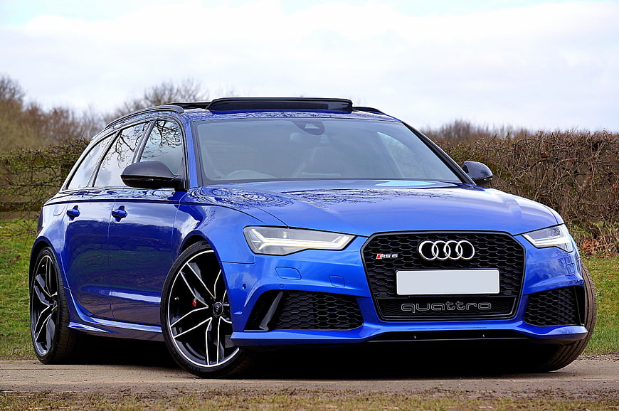 Blue Audi RS6 Avant Station Wagon Parked On Gravel Road