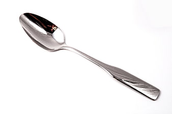 Polished Stainless Steel Soup Spoon On White Background