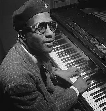 Vintage Black and White Portrait of Jazz Pianist at Upright Piano