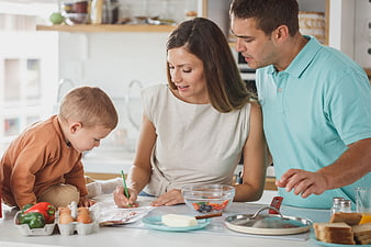 Family Planning Healthy Meals Together in Kitchen
