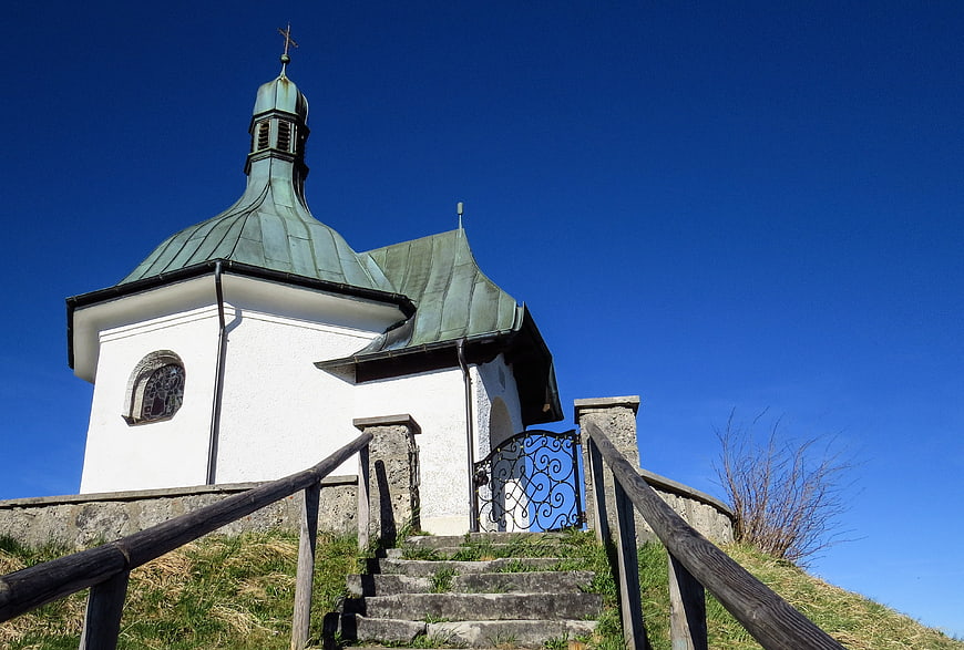White Chapel with Green Roof on Hillside