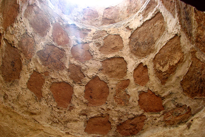 Textured Stone Wall with Plaster and Natural Light