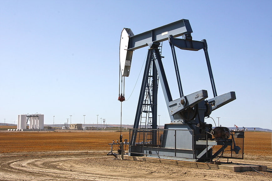 Oil Pump Jack Operating in Prairie Landscape