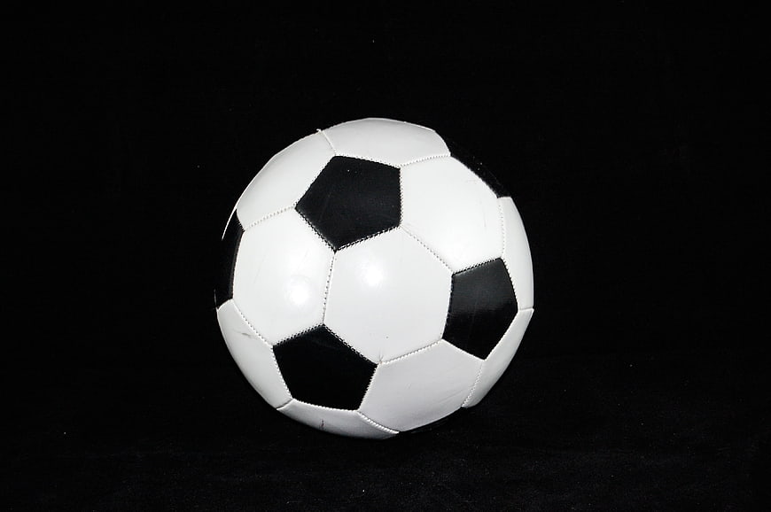 Classic Black And White Soccer Ball On Black Background