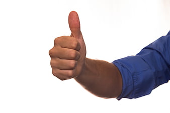 Man's Hand Giving Thumbs Up Gesture on White Background