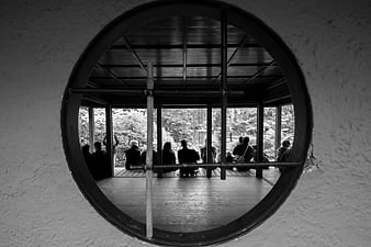 Black and white view through circular Japanese window