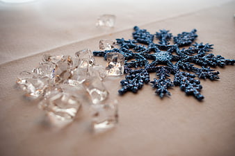 Blue Glitter Snowflake and Clear Crystals on Beige Fabric
