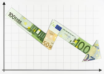 Euro Banknotes Forming Downward Trend Arrow on Financial Chart