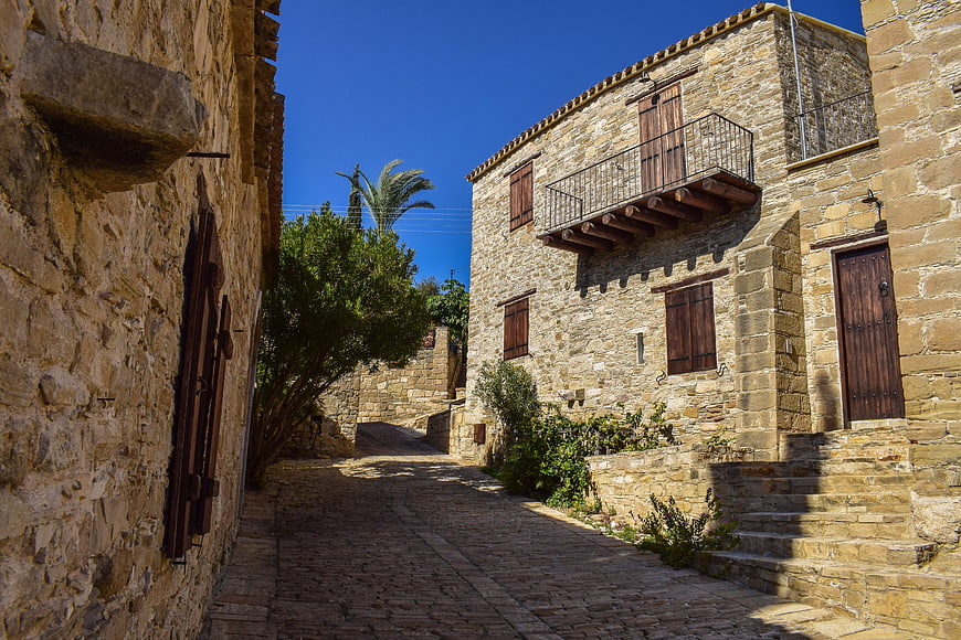 Narrow cobblestone street in traditional stone village, Cyprus