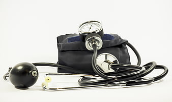 Sphygmomanometer and Stethoscope on White Background