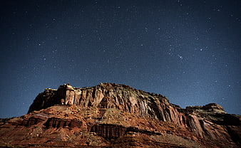 Red Rock Mountain Landscape Under Starry Night Sky