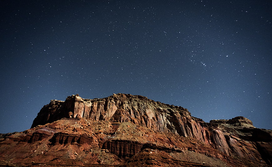 Red Rock Mountain Landscape Under Starry Night Sky